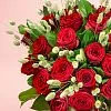 Фото Букет в вазе из красных роз